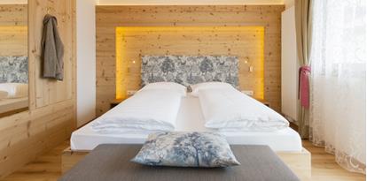Schlafzimmer mit Doppelbett der Komfortsuite 3-Raum
